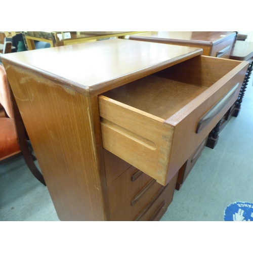 201 - A G-Plan teak dressing chest with six drawers, on a plinth  39