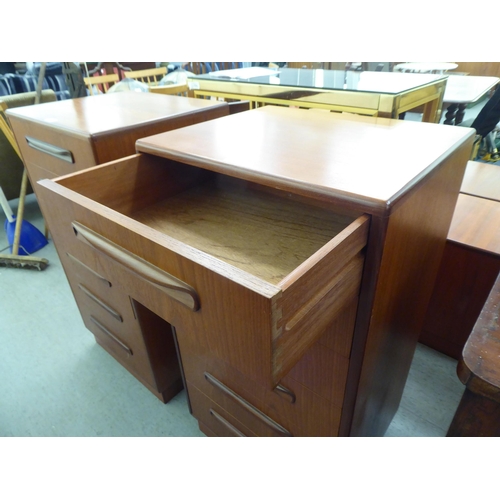 202 - A G-Plan teak dressing chest with six drawers, on a plinth  39