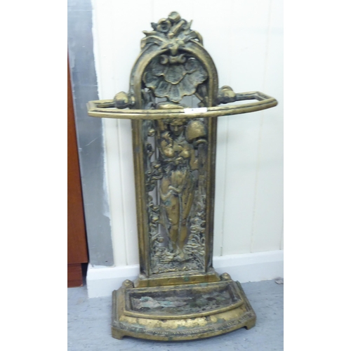 211 - A Victorian style cast brass stickstand, decorated with a female figure  