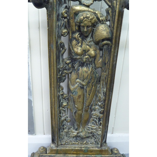 211 - A Victorian style cast brass stickstand, decorated with a female figure  