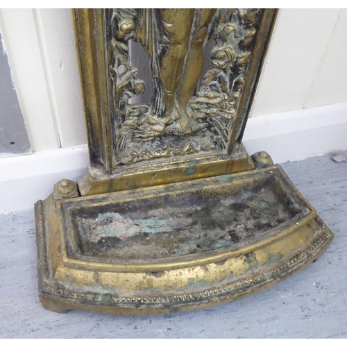 211 - A Victorian style cast brass stickstand, decorated with a female figure  