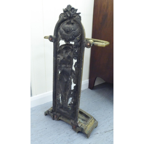 211 - A Victorian style cast brass stickstand, decorated with a female figure  