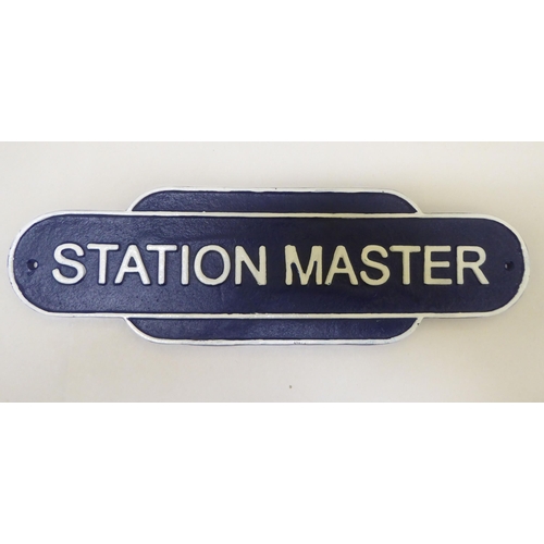 220 - A painted cast iron reproduction 'Station Master' sign