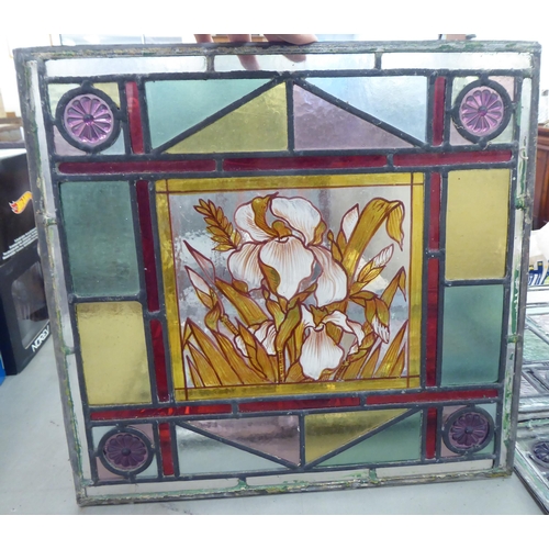 222 - Six stained and leaded glass panels, each decorated with floral images  15.5