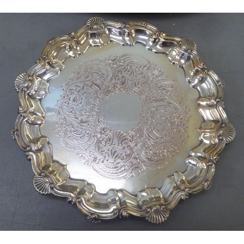 225 - Four items of silver plate: to include a tazza, decorated with floral patterns  4.5