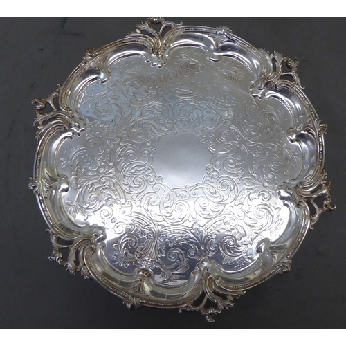 225 - Four items of silver plate: to include a tazza, decorated with floral patterns  4.5