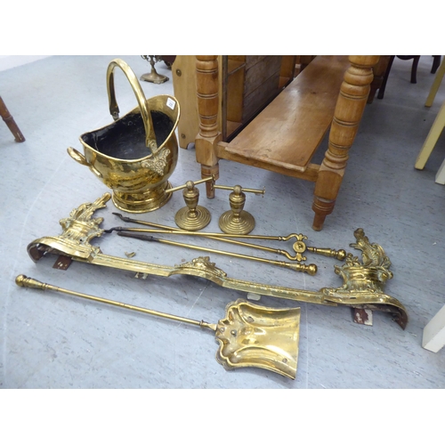 235 - Brass hearth accessories: to include a coal scuttle with a swing top handle  11