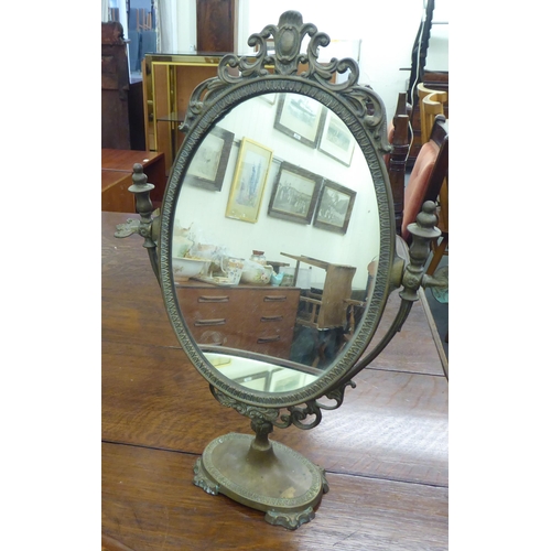 242 - Three mirrors: to include an Edwardian example, in a satinwood inlaid mahogany frame  16