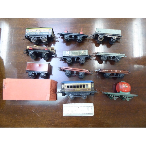 243 - Hornby tinplate 0 gauge model trains, track and accessories: to include a clockwork Goods Set No.30;... 