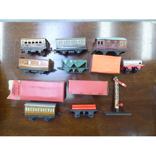 243 - Hornby tinplate 0 gauge model trains, track and accessories: to include a clockwork Goods Set No.30;... 