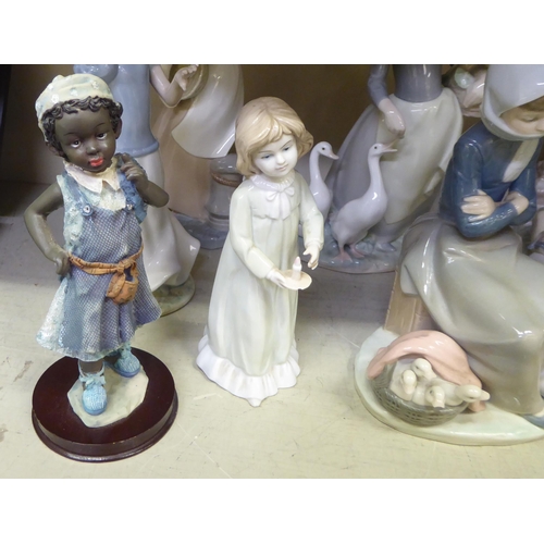 249 - Porcelain figures: to include a Lladro example, a young woman feeding geese  11