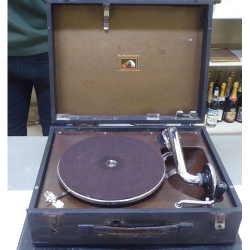 253 - A vintage portable HMV gramophone, in a hard carrying case  5.5