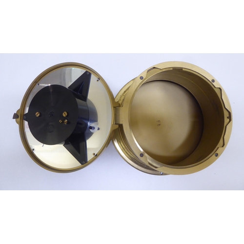 259 - A lacquered brass cased bulkhead 8 day timepiece; and similar barometer  each 7