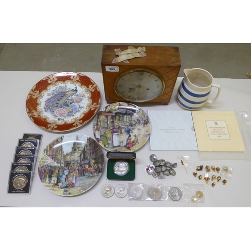 265 - A mixed lot: to include coins; and badges