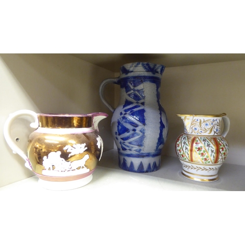 281 - Ceramics: to include an early 19thC (probably Spode) porcelain handpainted cream jug with flora and ... 