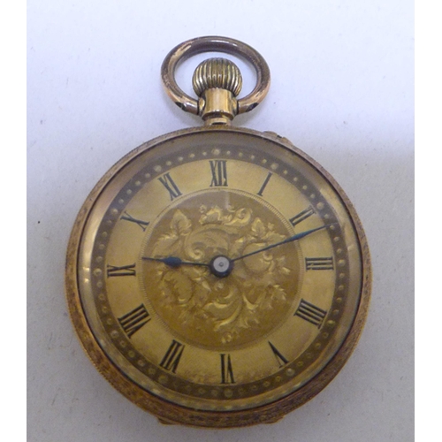 292 - A yellow metal watch, faced by a Roman dial  stamped 18k 