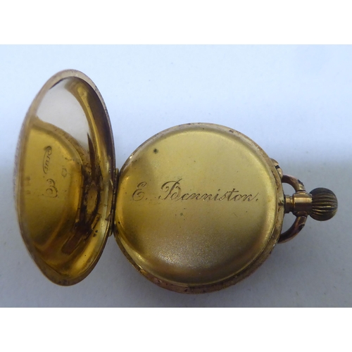 292 - A yellow metal watch, faced by a Roman dial  stamped 18k 