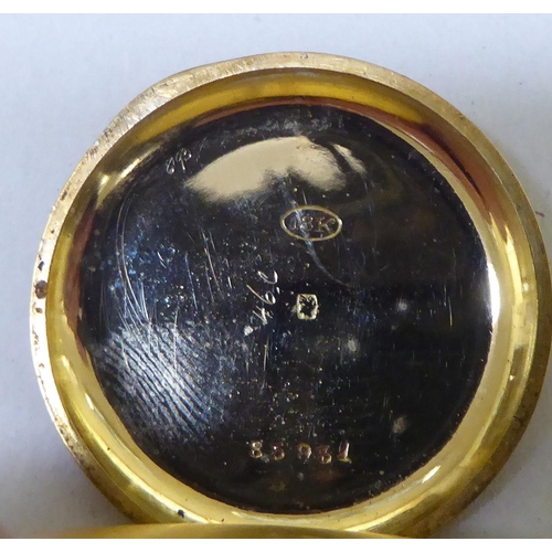 292 - A yellow metal watch, faced by a Roman dial  stamped 18k 