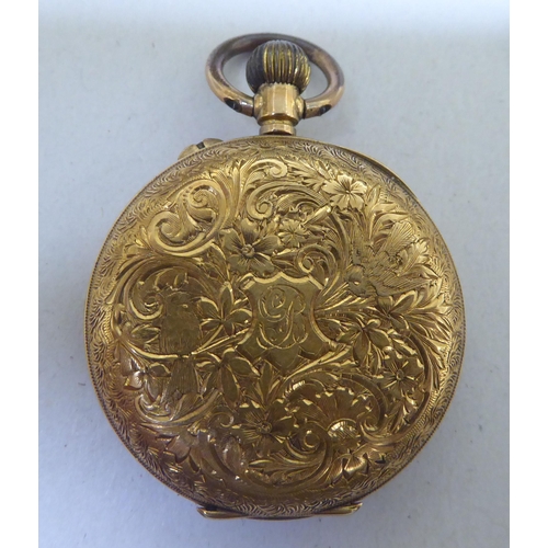 292 - A yellow metal watch, faced by a Roman dial  stamped 18k 