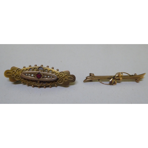 297 - Four Victorian and later items of personal ornament: to include a 9ct gold and pearl set brooch ... 