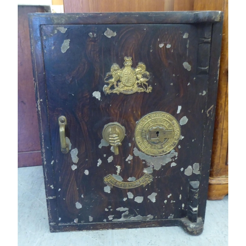 306 - A vintage Phillips & Son Fire Resisting floor safe with brass fittings (and key)  26