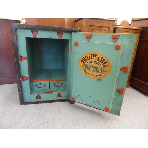 306 - A vintage Phillips & Son Fire Resisting floor safe with brass fittings (and key)  26