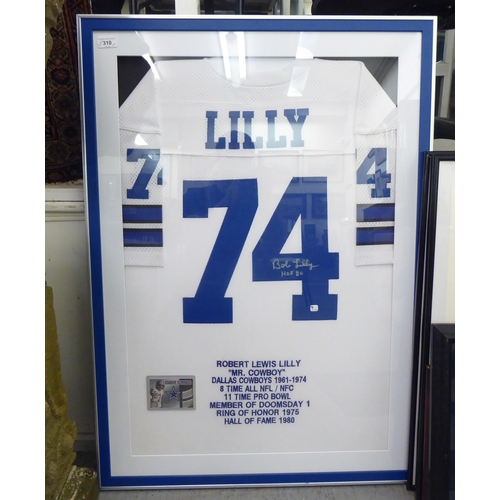 310 - NFL Dallas cowboy themed sporting memorabilia: to include a framed and signed Bob Lilly no.74 strip;... 