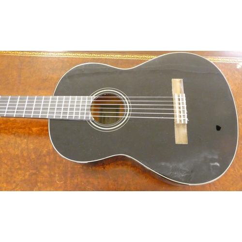 38 - A Yamaha C40 acoustic guitar, in a soft carrying case