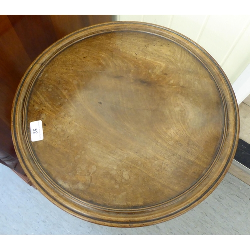 52 - A George III mahogany pedestal table, raised on a spiraltwist column and a tripod base  26