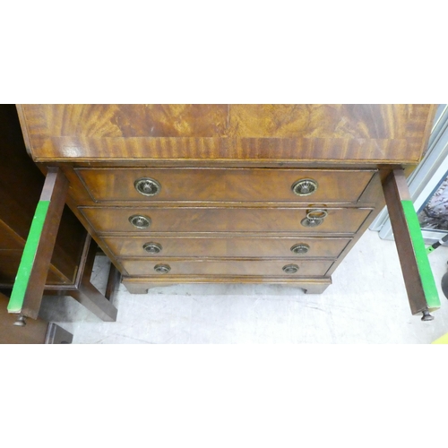 68 - A modern crossbanded mahogany bureau bookcase, raised on bracket feet&nbsp; 79