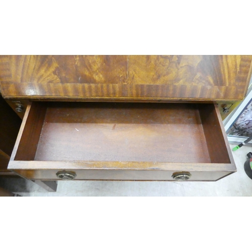 68 - A modern crossbanded mahogany bureau bookcase, raised on bracket feet&nbsp; 79