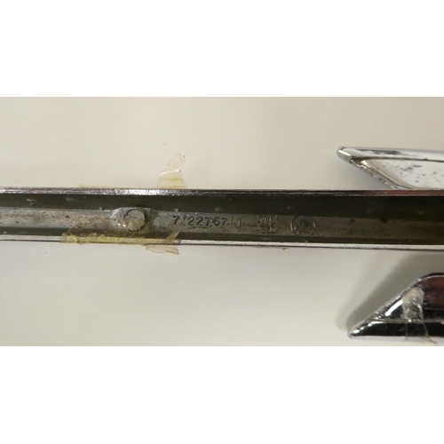 70 - Three various cast metal car mascots