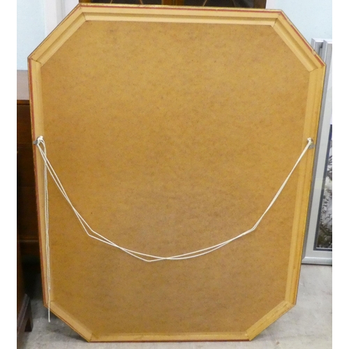 74 - A modern mirror, the bevelled plate set in an octagonal gilt frame&nbsp; 36