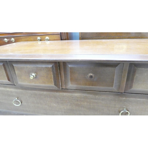 78 - A Stag mahogany six drawer dressing chest, raised on bracket feet&nbsp; 28