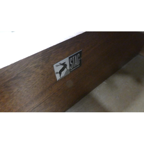 78 - A Stag mahogany six drawer dressing chest, raised on bracket feet&nbsp; 28