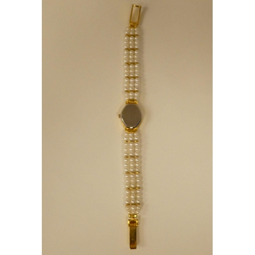 82 - Three ladies Guernsey gold plated and steel cased wristwatches, each pearl set   two boxed