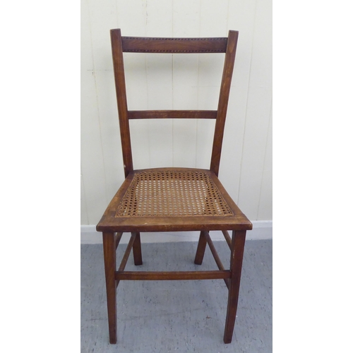 94 - Small furniture: to include two early 20thC beech framed, twin bar back bedroom chairs