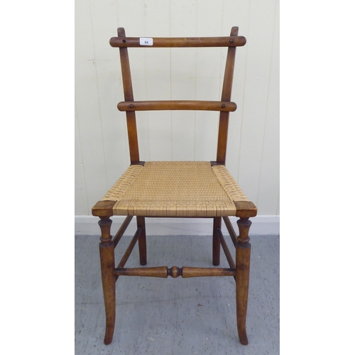 94 - Small furniture: to include two early 20thC beech framed, twin bar back bedroom chairs
