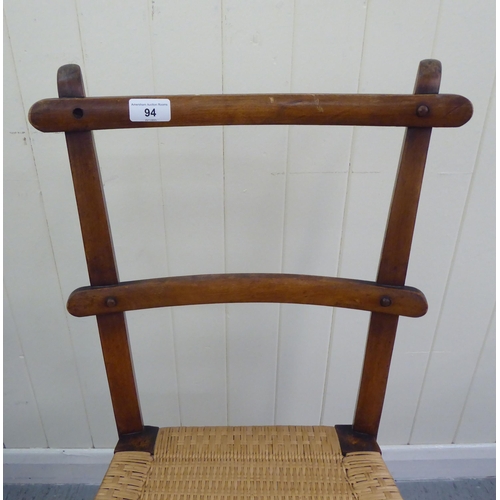 94 - Small furniture: to include two early 20thC beech framed, twin bar back bedroom chairs