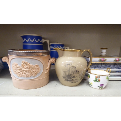 141 - 19thC Copeland and other Spode ceramic items: to include two blue jasper jugs; and a twin handled wi... 