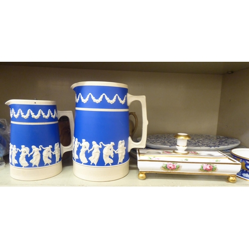 141 - 19thC Copeland and other Spode ceramic items: to include two blue jasper jugs; and a twin handled wi... 