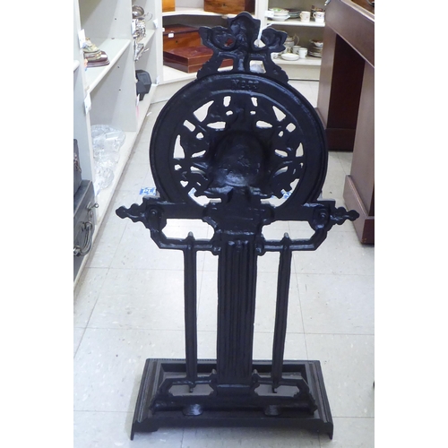 199 - A reproduction of a Victorian black painted cast iron stickstand  35