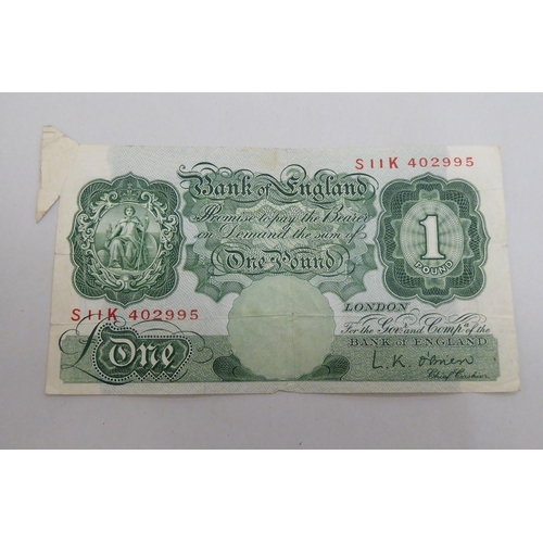 244 - A British £1 note, serial no.S11K402995 with production error on the corner