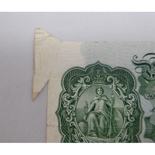 244 - A British £1 note, serial no.S11K402995 with production error on the corner