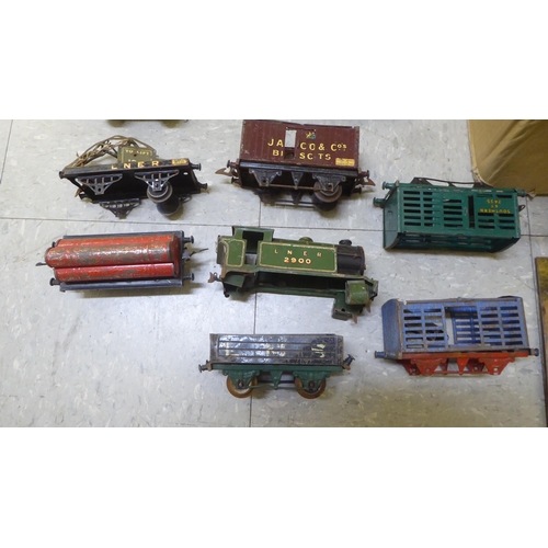 308 - Model railway related items by Hornby: to include track, tinplate buildings and rolling stock