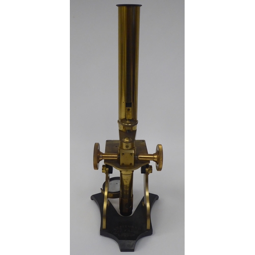 10 - An early 20thC JH Steward, 406 Strand, London, lacquered brass microscope with accessories in a cont... 