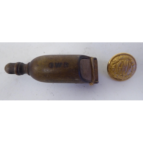 118 - A 19thC Great Western Railway guards wooden whistle with an impressed mark; and a later GWR Compton ... 