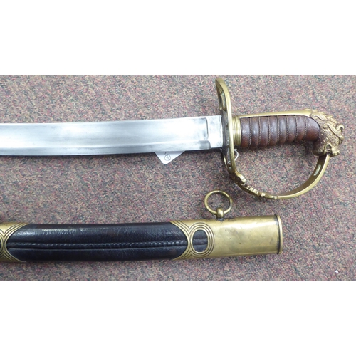 119 - A 19thC Continental style sabre with wire bound handgrip and lion's head pommel, the curved blade 31... 