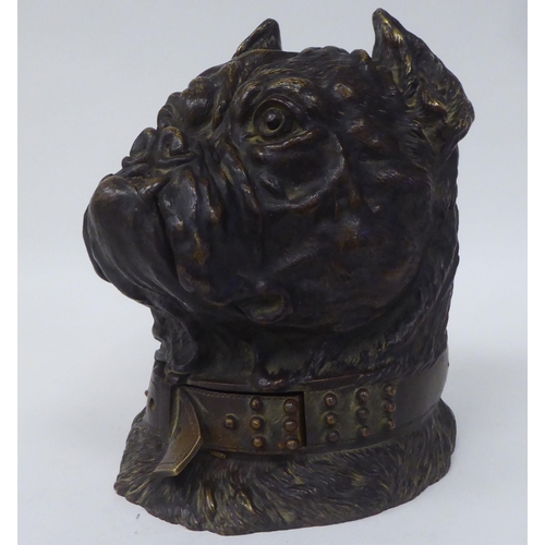 123 - An Austrian patinated bronze novelty desktop tobacco bowl, fashioned as a bulldog's head with a stud... 