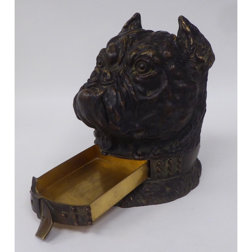 123 - An Austrian patinated bronze novelty desktop tobacco bowl, fashioned as a bulldog's head with a stud... 